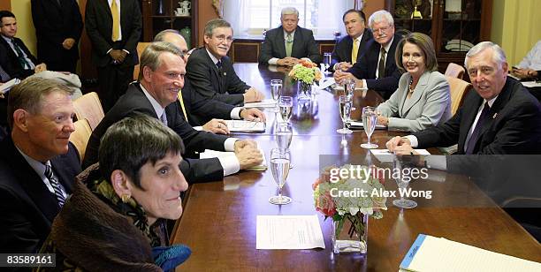 Rep. Rosa DeLauro looks on as President & CEO of Ford Alan Mullally, CEO of General Motors Richard Wagoner, Jr., and United Auto Workers President...