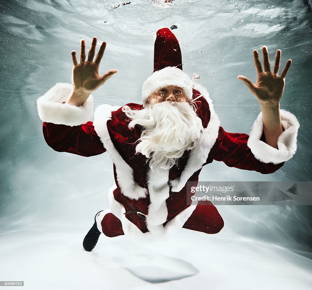 Santa Claus under water