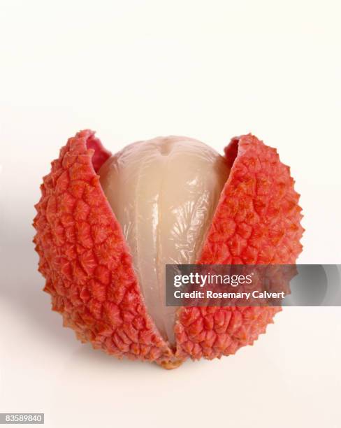 lychee split open. - litchi foto e immagini stock