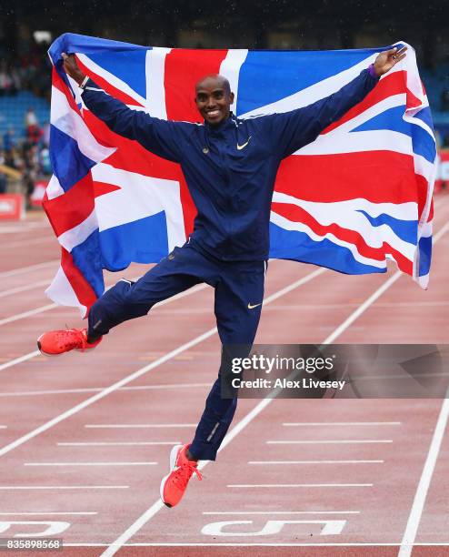 Mo Farah of Great Britain celebrates winning the Men's 3000m, his last UK track race during the Muller Grand Prix Birmingham as part of the IAAF...