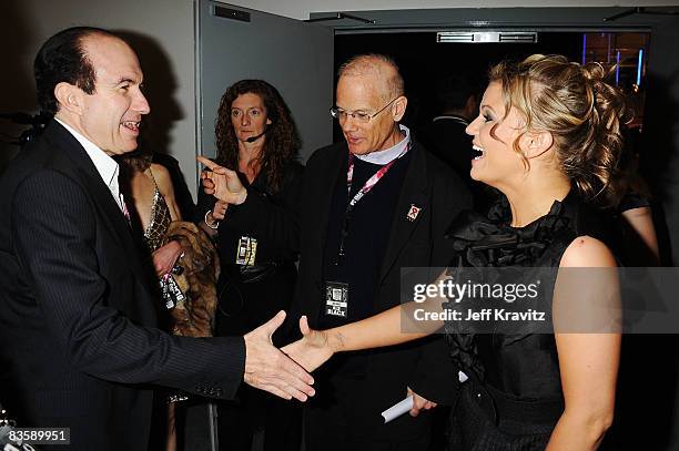 Philippe Dauman, chairman of MTV , meets Kerry Katona as Billy Roedy, President of MTV Networks International looks on at the 2008 MTV Europe Music...