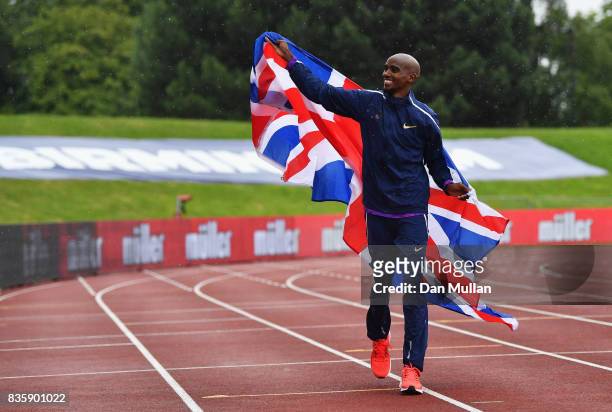 Mo Farah of Great Britain celebrates winning the Men's 3000m, his last UK track race during the Muller Grand Prix Birmingham as part of the IAAF...