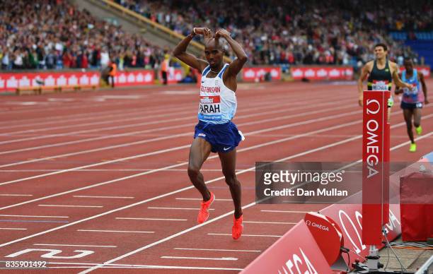 Mo Farah of Great Britain crosses the line to win the Men's 3000m, his last UK track race during the Muller Grand Prix Birmingham as part of the IAAF...