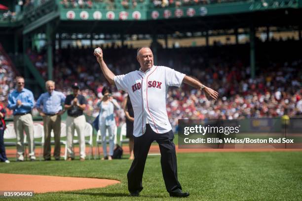 Broadcaster Jerry Remy throws a ceremonial first pitch during a 30 year recognition ceremony before a game between the Boston Red Sox and the New...