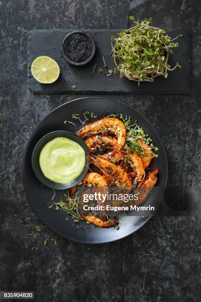 grilled tiger prawns with wasabi - black plate stock pictures, royalty-free photos & images