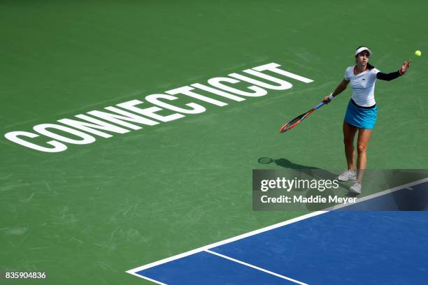 Christina McHale of the United States serves to Jana Cepelova of Slovakia during Day 3 of the Connecticut Open at Connecticut Tennis Center at Yale...