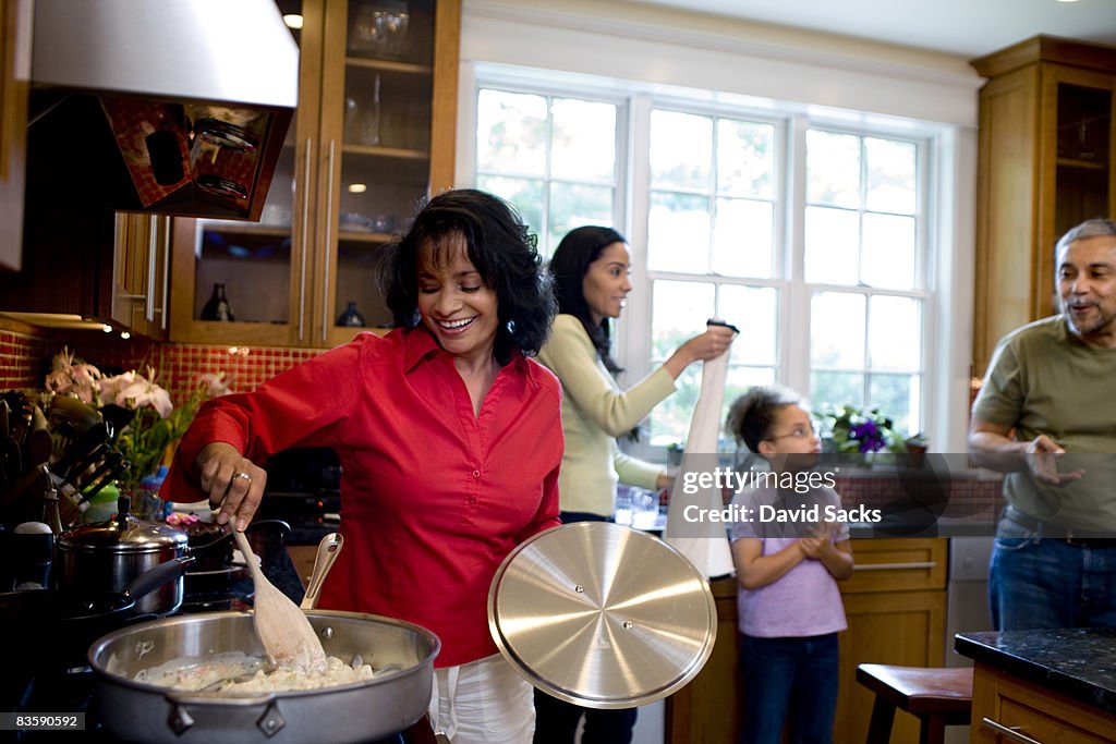 Multigenerational family together in kitchen