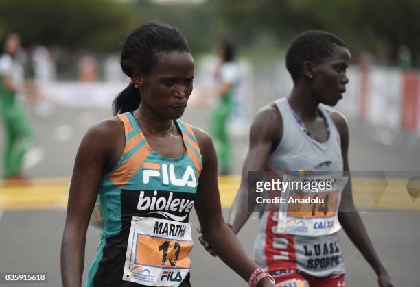 Martha Akeno and Esther Chesang Kakuri of Ethiopia attend the Rio de Janeiro International Women's Half Marathon in Rio de Janeiro, Brazil on August...