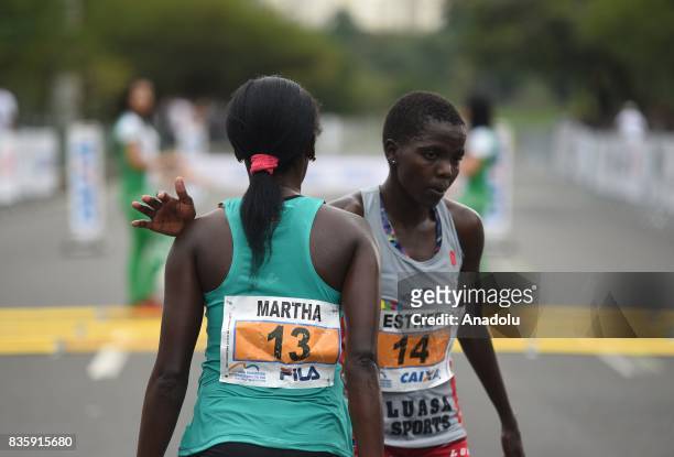 Martha Akeno and Esther Chesang Kakuri of Ethiopia attend the Rio de Janeiro International Women's Half Marathon in Rio de Janeiro, Brazil on August...