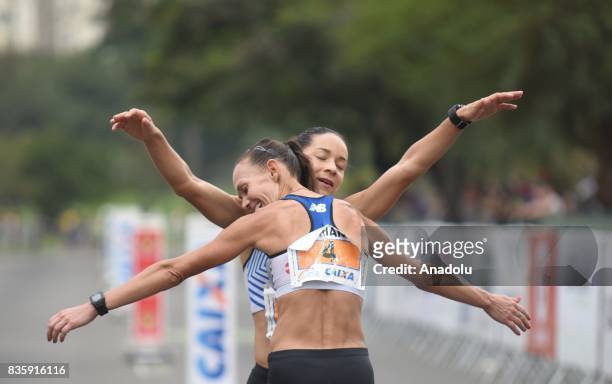 Andréia Aparecida Hessel and Adriana Aparecida da Silva of Brazil congratulate each other after the Rio de Janeiro International Women's Half...