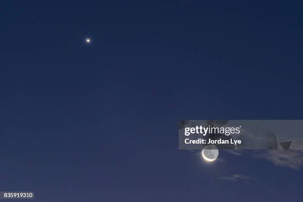 moon with earth shine and venus - 金星 ストックフォトと画像