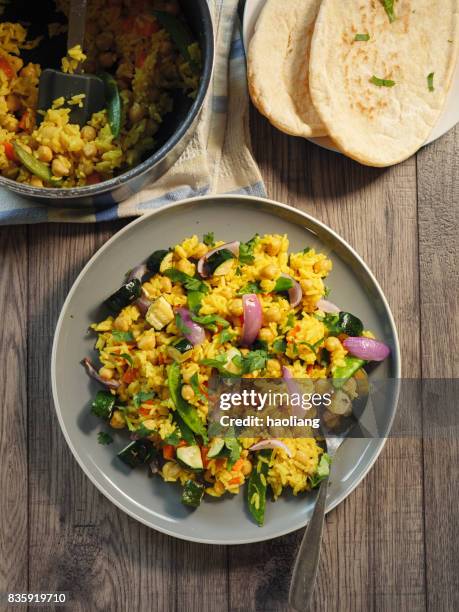 vegetarian pilaf rice with pitta bread - pilau rice stock pictures, royalty-free photos & images