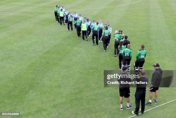 Teams shake hands after the Kia Super League between Yorkshire Diamonds v Western Storm at York on August 20, 2017 in York, England.