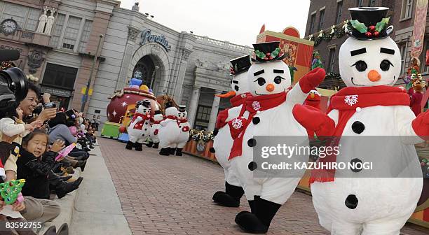 Snowmen, characters of amusement park Universal Studios Japan , perform for the Christmas show "Santa's Toy Park" as part of its winter festival in...