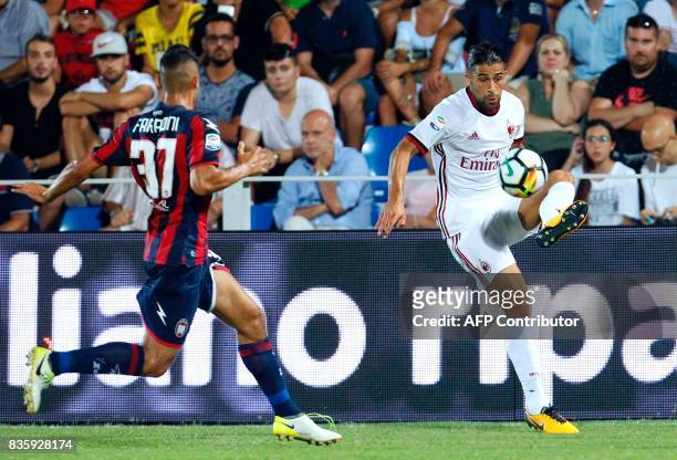 Milan's Swiss defender Ricardo Rodriguez controls the ball near Crotone's Italian defender Davide Faraoni during the Italian Serie A football match...