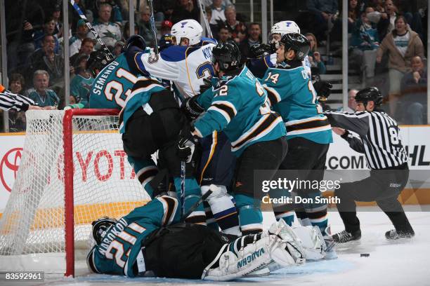 The San Jose Sharks and St. Louis Blues scuffle in front of the net during an NHL game on November 6, 2008 at HP Pavilion at San Jose in San Jose,...