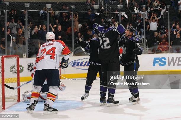 Brian Boyle of the Los Angeles Kings celebrates his first season goal with his teammates during the game against the Florida Panthers at Staples...