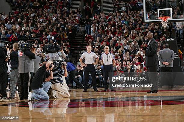 Former Portland Trail Blazer Jerome Kersey pays his respects to the passing of former player Kevin Duckworth during a game against the Houston...