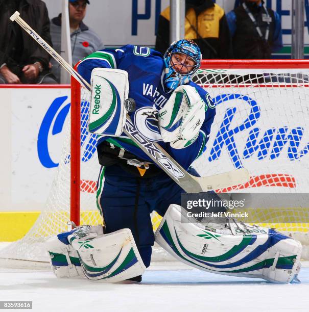 Roberto Luongo of the Vancouver Canucks makes a save off a Phoenix Coyotes shot during their game at General Motors Place on November 6, 2008 in...