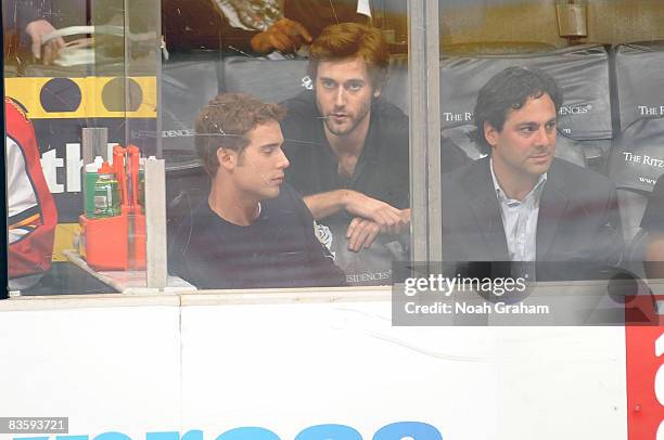 Actors Dustin Mulligan and Ryan Eggold attend the NHL game between the Florida Panthers and the Los Angeles Kings during the game at Staples Center...