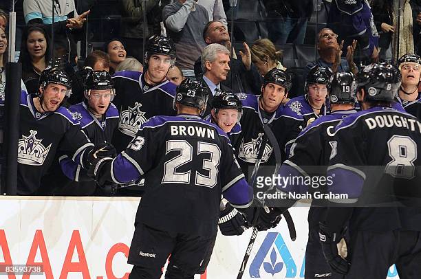 The Los Angeles Kings celebrate a third period goal from teammate Dustin Brown during the game against the Florida Panthers at Staples Center...