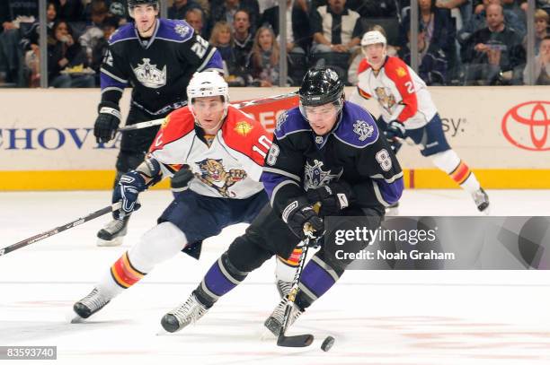 David Booth of the Florida Panthers chases the puck against Drew Doughty of the Los Angeles Kings during the game at Staples Center November 6, 2008...