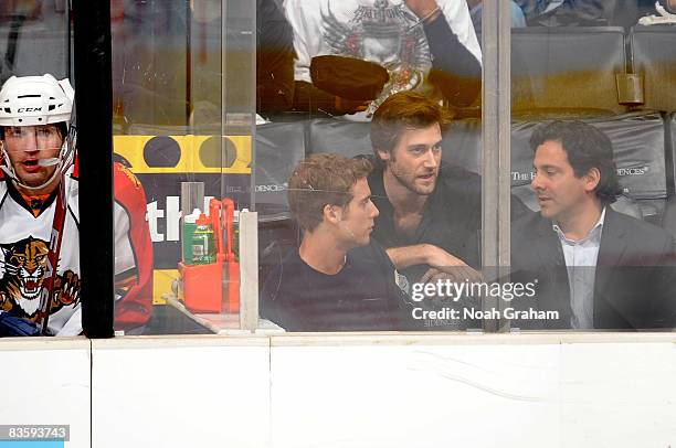 Actors Dustin Mulligan and Ryan Eggold attend the NHL game between the Florida Panthers and the Los Angeles Kings during the game at Staples Center...