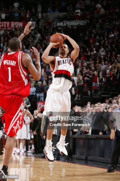 Brandon Roy of the Portland Trail Blazers takes the game winning shot over Tracy McGrady of the Houston Rockets during a game on November 6, 2008 at...