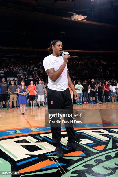 Kia Vaughn of the New York Liberty gives a speech to honor Unity Day before the game against the Minnesota Lynx during the WNBA game on August 20,...