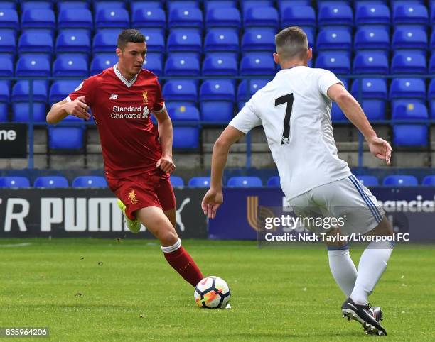 Lloyd Jones of Liverpool and Luke Molyneux of Sunderland in action during the Liverpool v Sunderland U23 Premier League game at Prenton Park on...