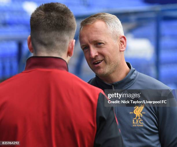 Liverpool U23 manager Neil Critchley cahts with Ryan Kent after the Liverpool v Sunderland U23 Premier League game at Prenton Park on August 20, 2017...