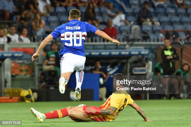 Gaston Ramirez of Sampdoria is tackled by Lorenzo Venuti of Benevento during the Serie A match between UC Sampdoria and Benevento Calcio at Stadio...