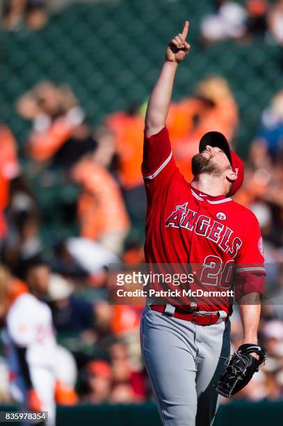 Bud Norris of the Los Angeles Angels of Anaheim celebrates after the Angels defeated the Baltimore Orioles 5-4 during a game at Oriole Park at Camden...