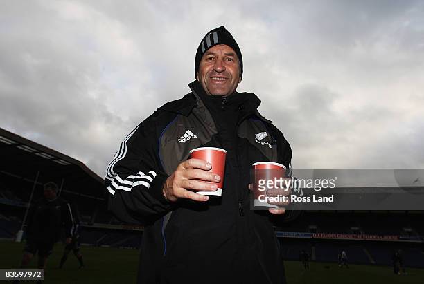 Wayne Smith, back line coach of the All Blacks, warms up with coffee during the New Zealand All Blacks captains run at Murryfield November 07, 2008...