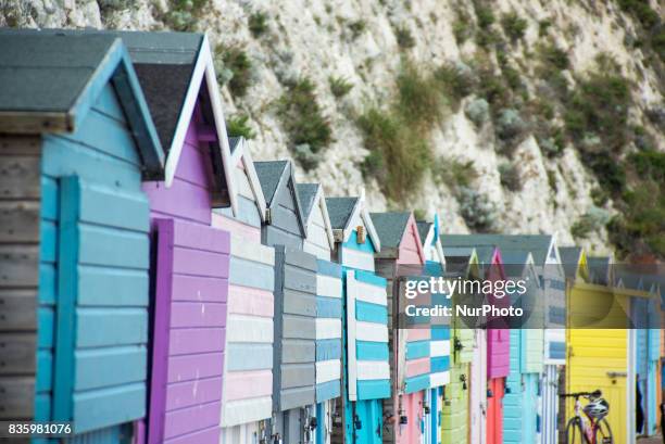 Beach huts are pictured on a promenade in Broadstairs in a summer Sunday, on August 20, 2017. Broadstairs is is a coastal town in the Thanet district...