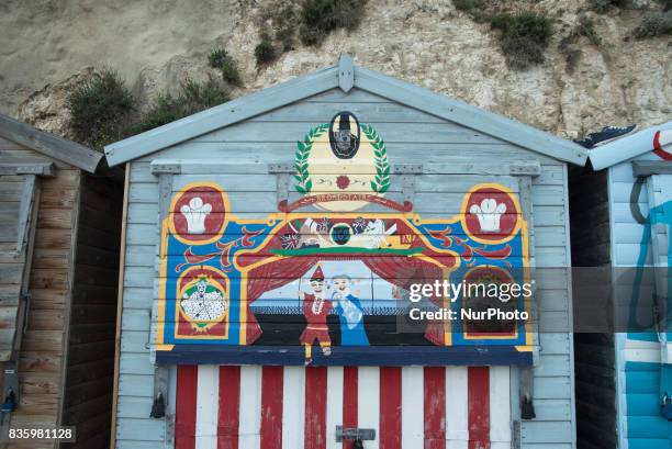 Beach huts are pictured on a promenade in Broadstairs in a summer Sunday, on August 20, 2017. Broadstairs is is a coastal town in the Thanet district...