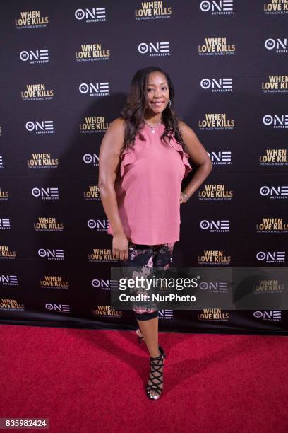 Asia Chandler, The Donnie Simpson Show, poses for a photo on the red carpet, at TV One's DC Premiere of When Love Kills: The Falicia Blakely Story,...