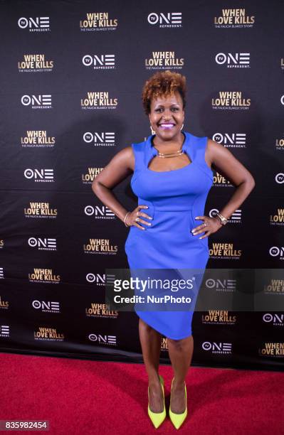 Tia Smith, TV One Senior Director of Original Programming/Production, poses for a photo on the red carpet, at TV One's DC Premiere of When Love...