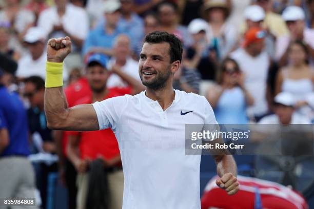 Grigor Dimitrov of Bulgaria celebrates after defeating Nick Kyrgios of Australia to win the men's final during Day 9 of of the Western and Southern...