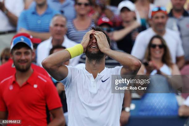 Grigor Dimitrov of Bulgaria celebrates after defeating Nick Kyrgios of Australia to win the men's final during Day 9 of of the Western and Southern...