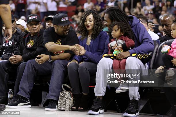 Co-founder Ice Cube shakes hands with Richard Sherman of the Seattle Seahawks while attending week nine of the BIG3 three-on-three basketball league...