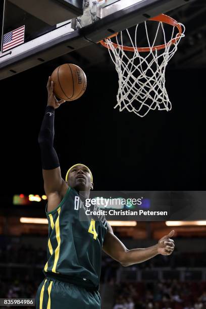 Derrick Byars of the Ball Hogs lays up the ball against the Killer 3s in week nine of the BIG3 three-on-three basketball league at KeyArena on August...