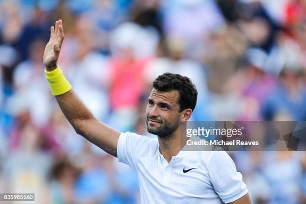 Grigor Dimitrov of Bulgaria celebrates after defeating Nick Kyrgios of Austrailia in the men's final on Day 9 of the Western and Southern Open at the...