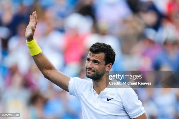 Grigor Dimitrov of Bulgaria celebrates after defeating Nick Kyrgios of Austrailia in the men's final on Day 9 of the Western and Southern Open at the...