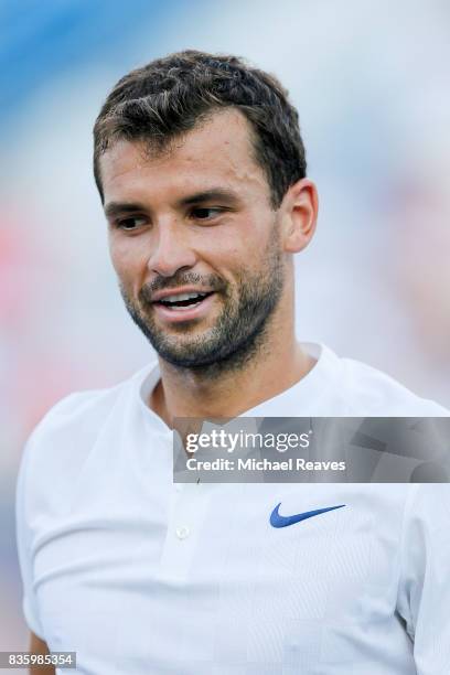Grigor Dimitrov of Bulgaria celebrates after defeating Nick Kyrgios of Austrailia in the men's final on Day 9 of the Western and Southern Open at the...
