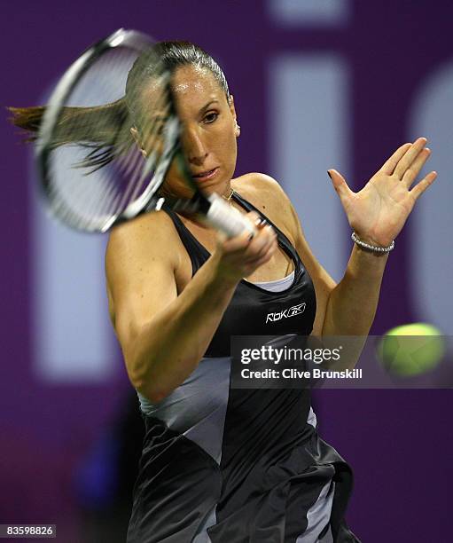 Jelena Jankovic of Serbia plays a forehand against Vera Zvonareva of Russia in their round robin match during the Sony Ericsson Championships at the...