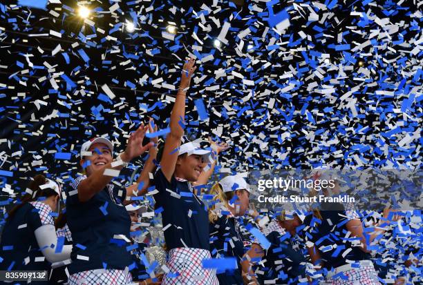 Danielle Kang and Cristie Kerr of Team USA celebrate during the closing ceremony after the final day singles matches of The Solheim Cup at Des Moines...