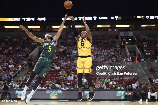 Mo Evans of the Killer 3s shoots the ball in front of Xavier Silas of the Ball Hogs in week nine of the BIG3 three-on-three basketball league at...