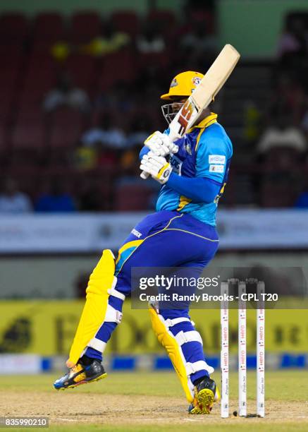 In this handout image provided by CPL T20, Dwayne Smith of Barbados Tridents hits 6 during Match 19 of the 2017 Hero Caribbean Premier League between...