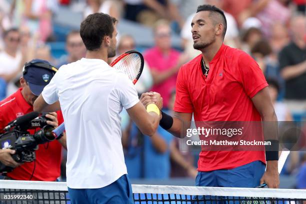 Grigor Dimitrov of Bulgaria is congratulated by Nick Kyrgios of Australia after their match during the men's final on day 9 of the Western & Southern...